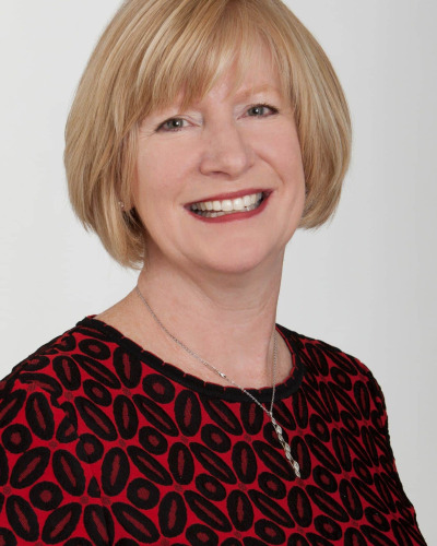 Headshot of Michelle Watson, CFA, CAIA, CFP®